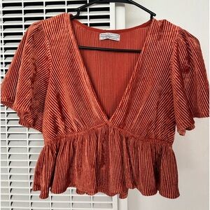 Urban outfitters burnt orange velvet ribbed peplum top